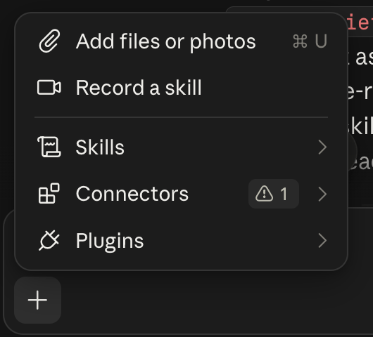 The plus menu in a Claude Cowork session on my Mac, September 5, 2026: Add files or photos, Record a skill, then Skills, Connectors with one warning badge, and Plugins
